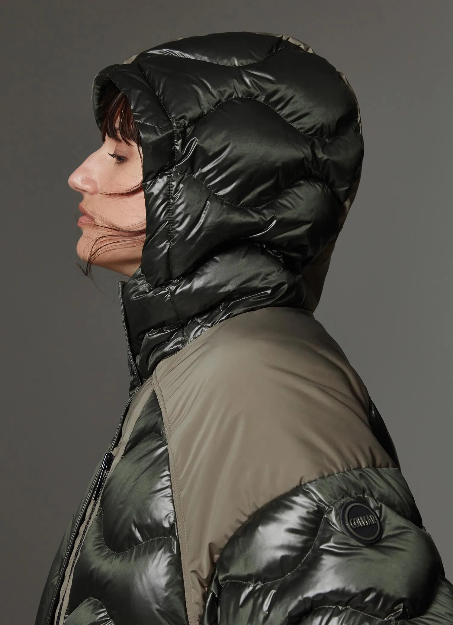 Bomber jacket with fixed hood and bubble quilting