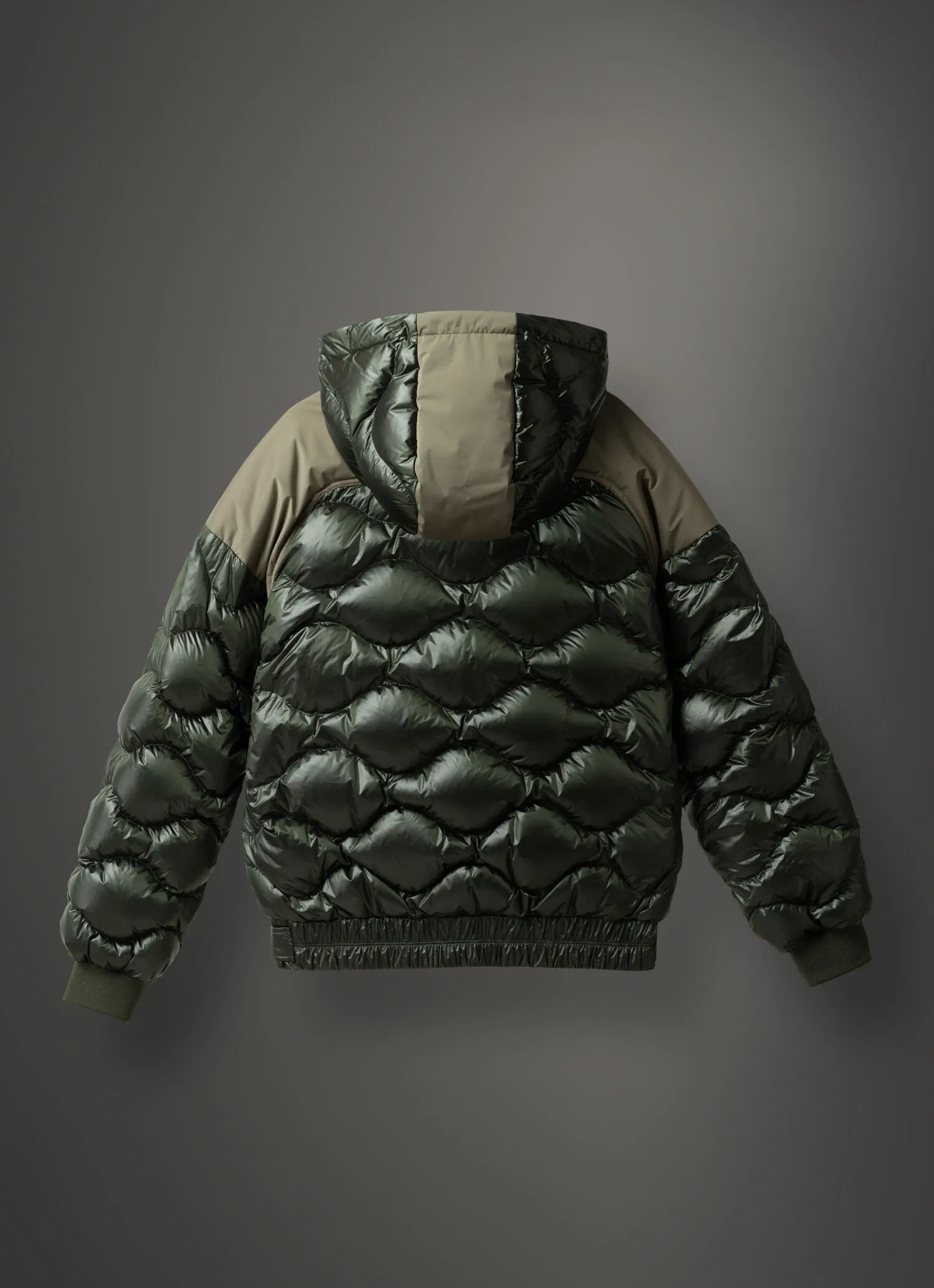 Bomber jacket with fixed hood and bubble quilting