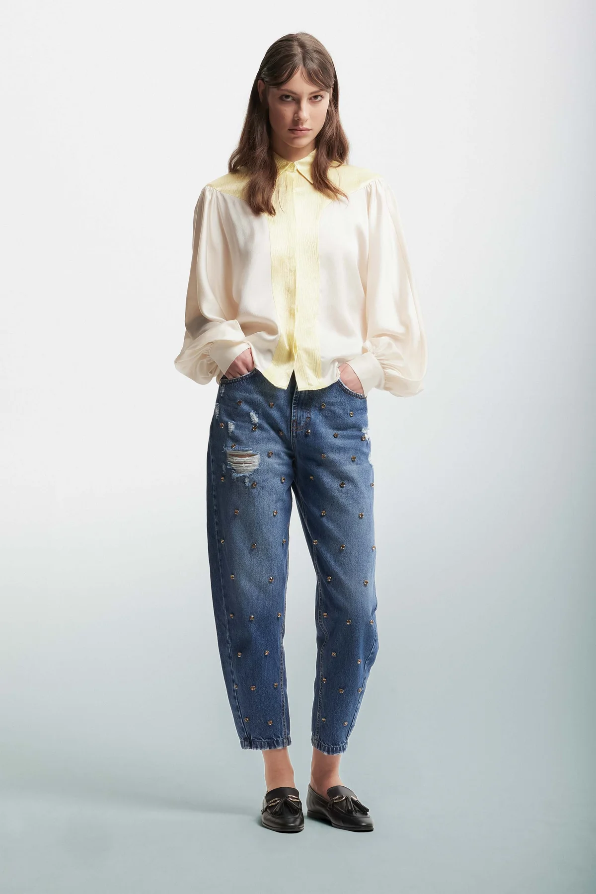 Jeans con borchie